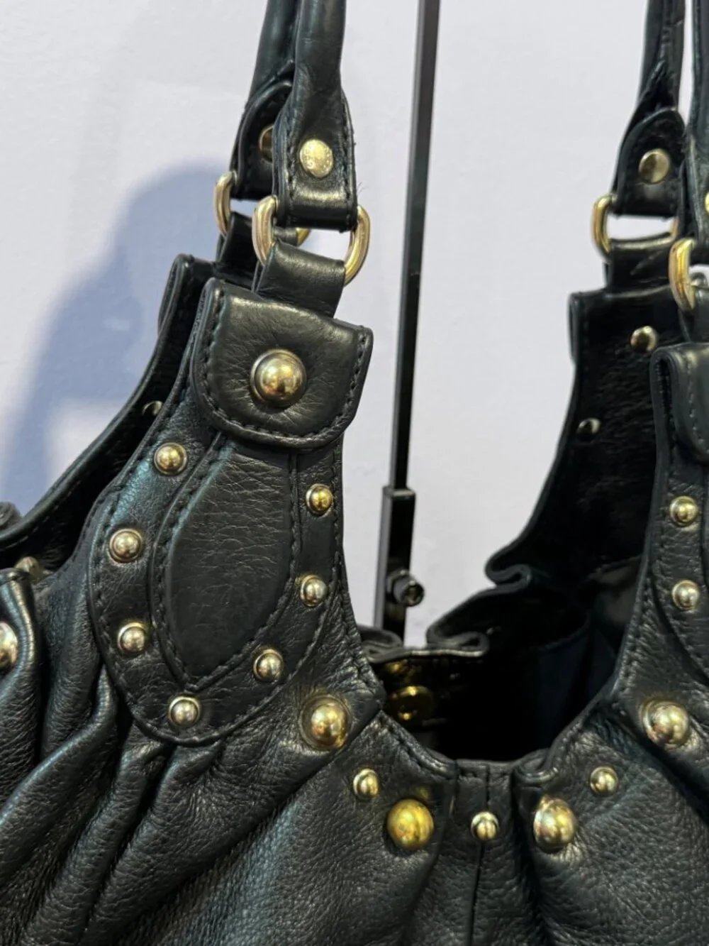 Rare Gucci Black butter-soft calfskin leather-studded Pelham shoulder bag